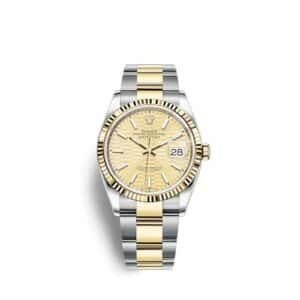 Rolex Datejust 36 Stainless Steel and Yellow Gold Champagne Motif Index Dial Oyster Fluted Bezel
Ref. 126233-0040